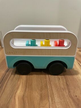 Lovevery Wheel Around Town Bus Children Toy With Three Peg People